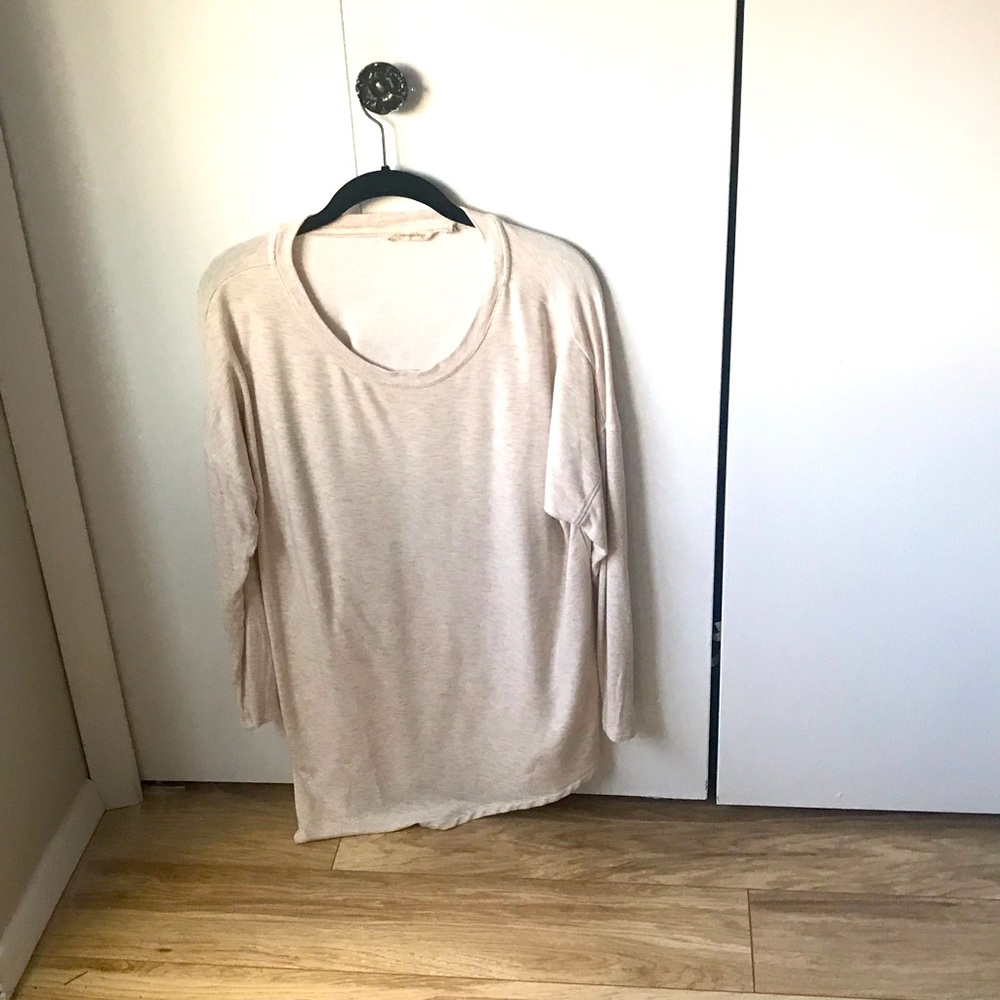 Long sleeve top. Crème color excellent condition.